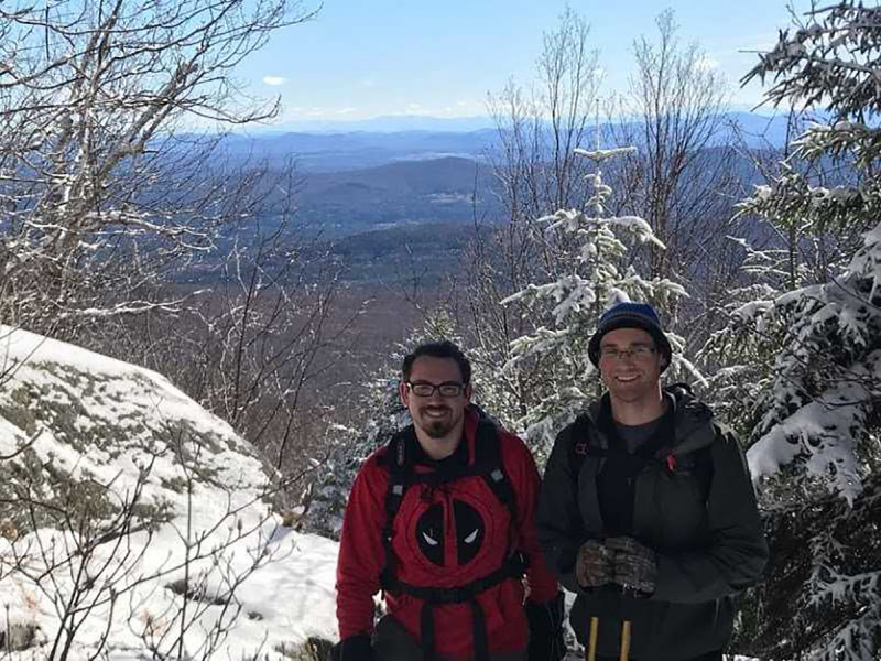 Montpelier students Ryan May, left, and Evan Spencer hiked Mt. Hunger last week to raise awareness for the center's food drive.