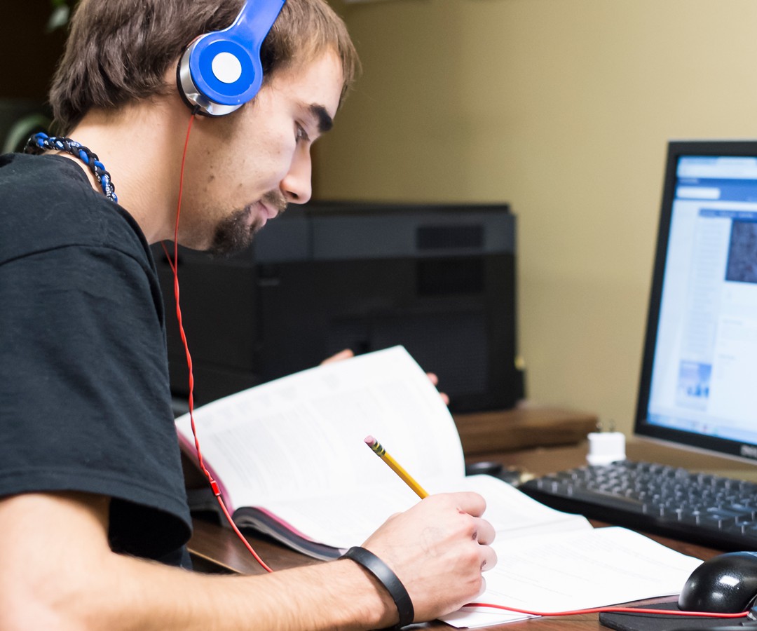 CCV student working at a computer.