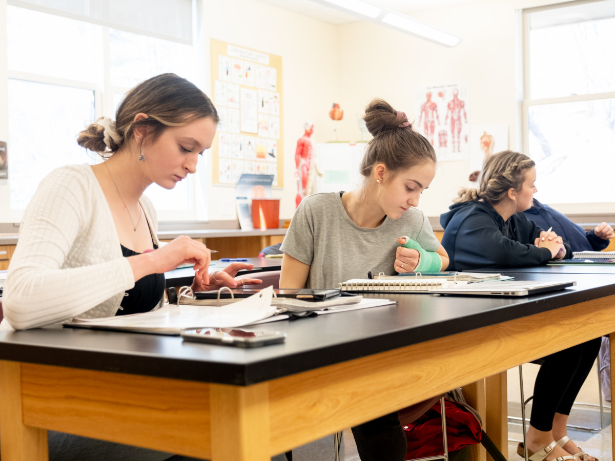 Girls at table in classroom