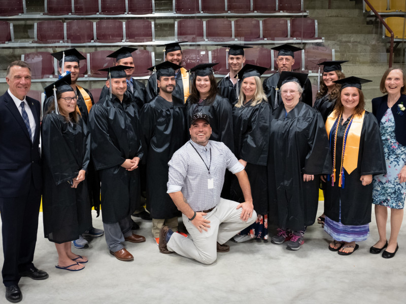 Veteran and military graduates with Governor Phil Scott at CCV's 2019 commencement.